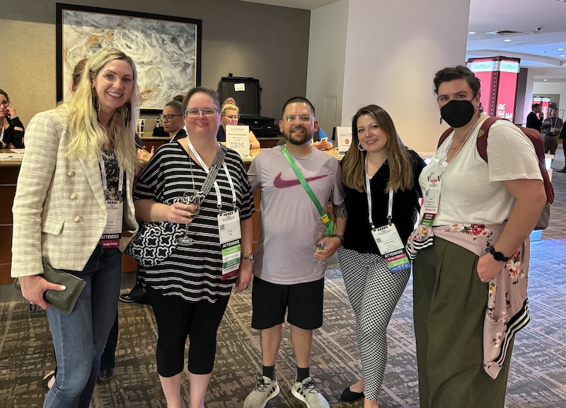 Group photo of Onward Accessibility team members and attendees at CSUN Conference.