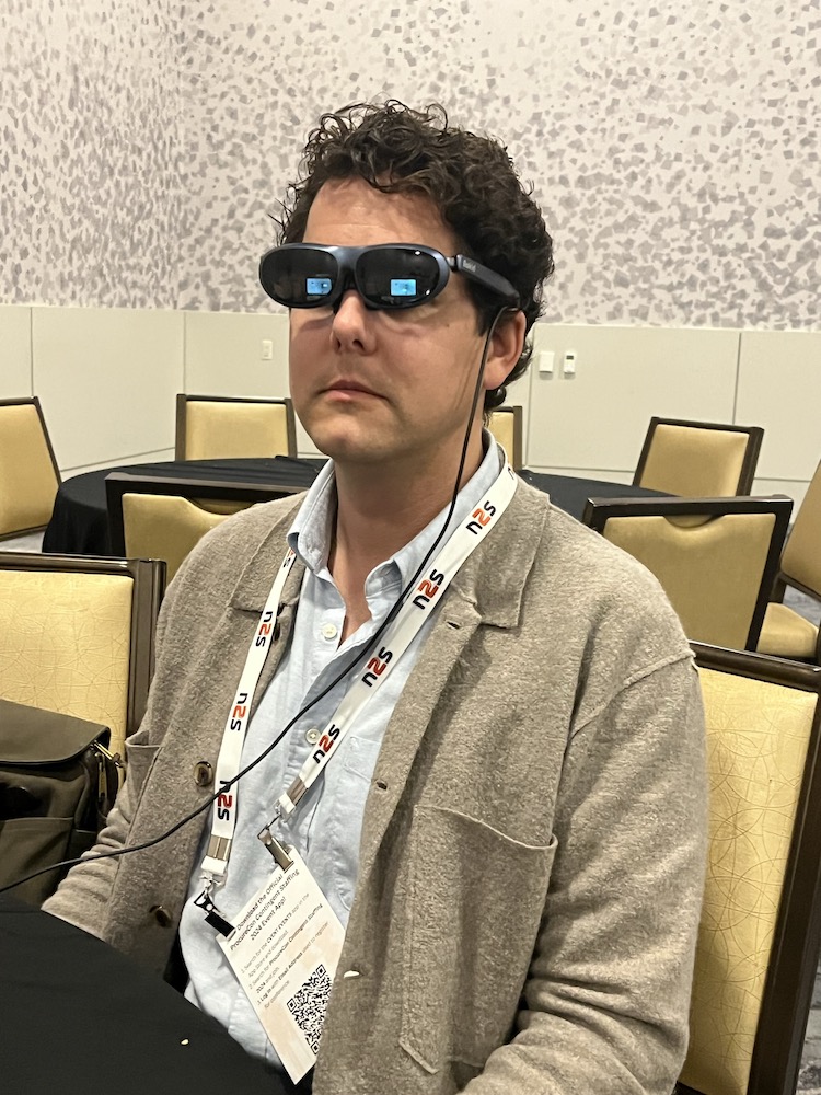 Orris Long, SVP of Sales, testing out VR Goggles at an industry conference.